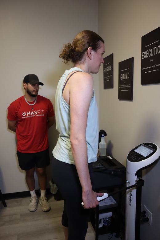 A HASfit trainer running a client through an InBody 570 scan